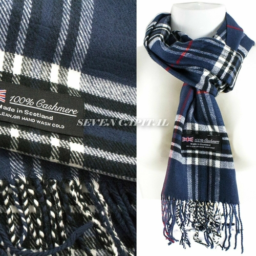 Navy and white plaid cashmere scarf with brand label on a white background