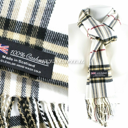 A plaid cashmere scarf shown in a split view: close-up of the fabric and fringe on the left, and the scarf draped on a white mannequin on the right. The color identity is primarily off-white/cream with black and beige plaid stripes and thin red lines.