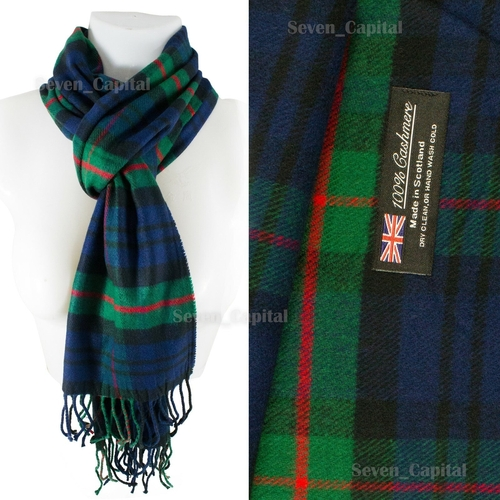 Plaid scarf with visible brand label on a white background