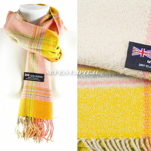 Plaid scarf with a brand label on a white background