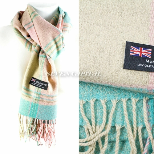 Plaid scarf with brand label and British flag label on a white background