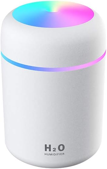 White humidifier with colorful LED light on a white background