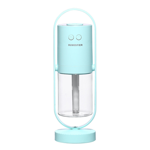 Turquoise humidifier with clear water tank on a white background