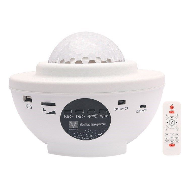 A white multi-functional LED light projector with a built-in dome lens and a separate white remote control, shown on a plain white background.