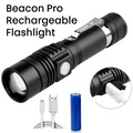 Black rechargeable flashlight labeled 'Beacon Pro Rechargeable Flashlight' on a white background, with a USB charging cable, a blue battery, and an inset showing the charging connector.