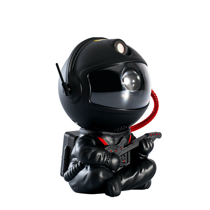 Black robot figurine with helmet and red accents on a white background