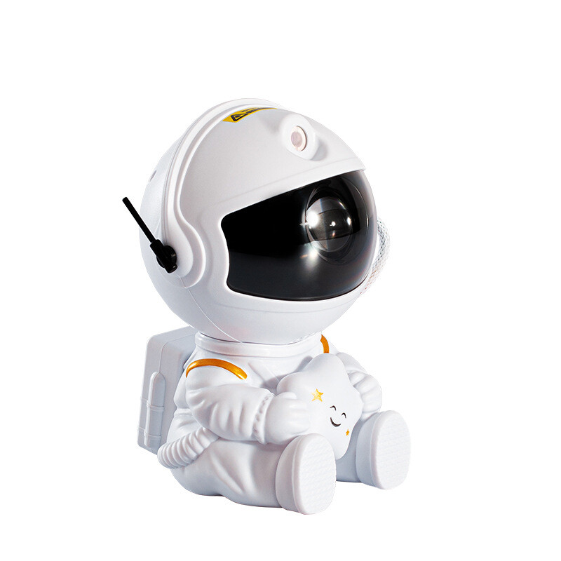 White astronaut toy with a black visor on a white background