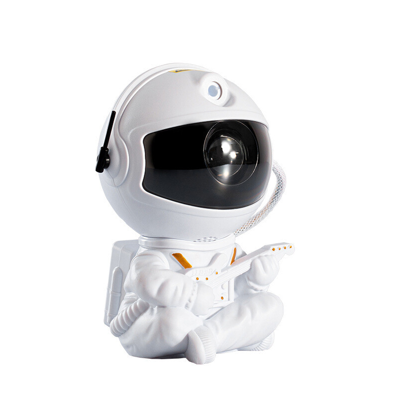 White astronaut figurine holding a tablet on a white background