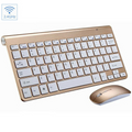 Gold and white wireless keyboard and mouse set on a white background