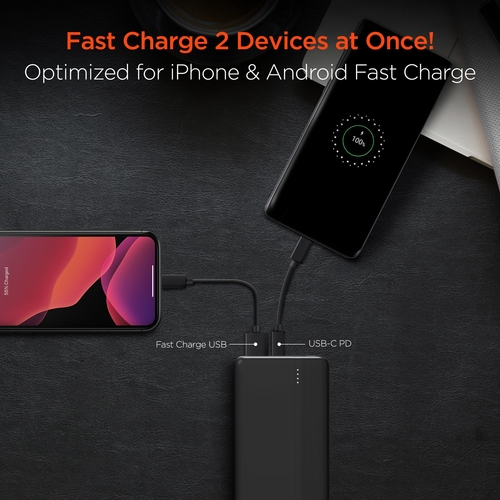 Power bank charging two smartphones with text highlighting fast charging capabilities on a dark background.