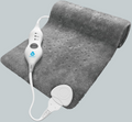 A gray heated massage mat with a white wired controller and a separate white electrode pad, shown on a plain light gray background.