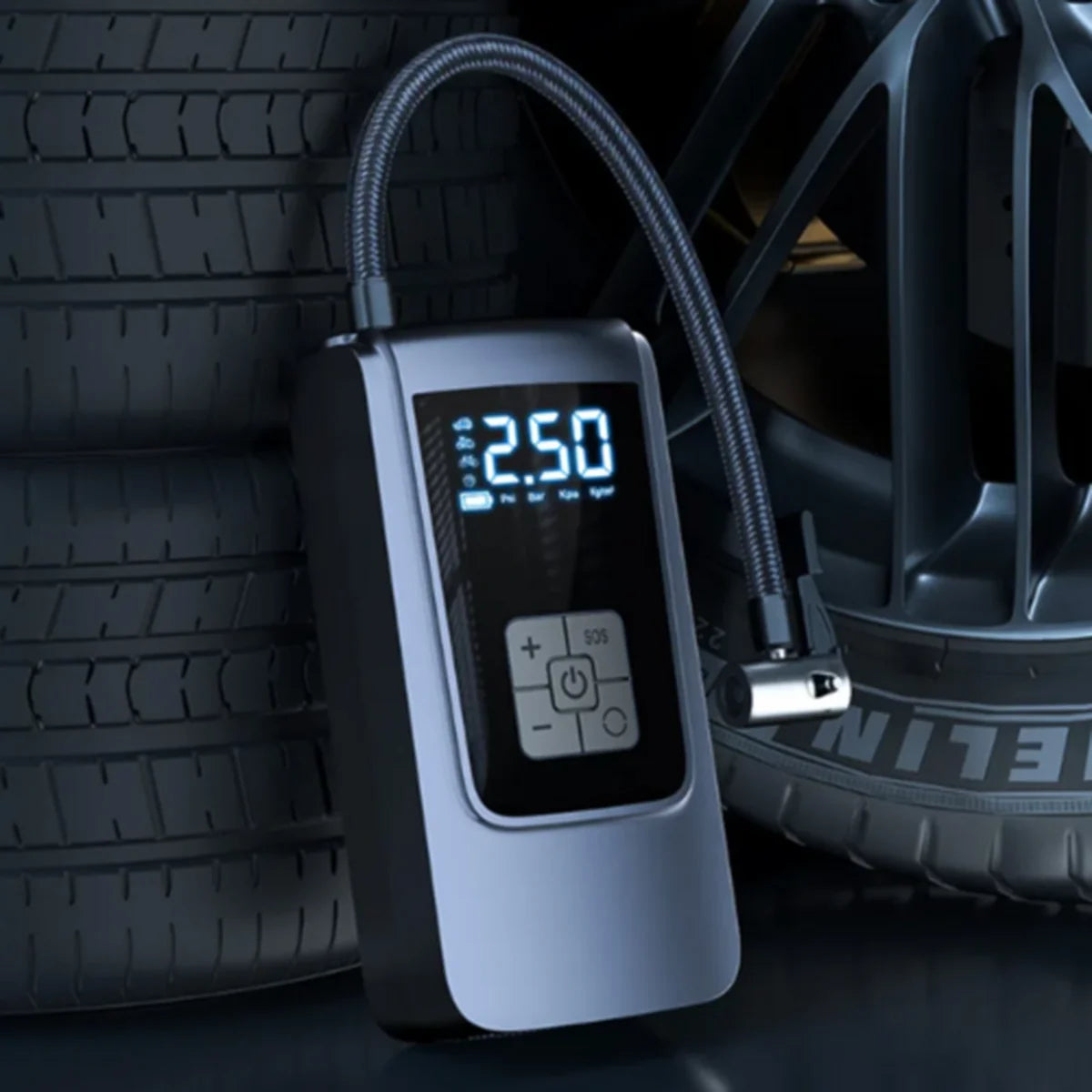 Digital tire pressure gauge with a car tire in the background