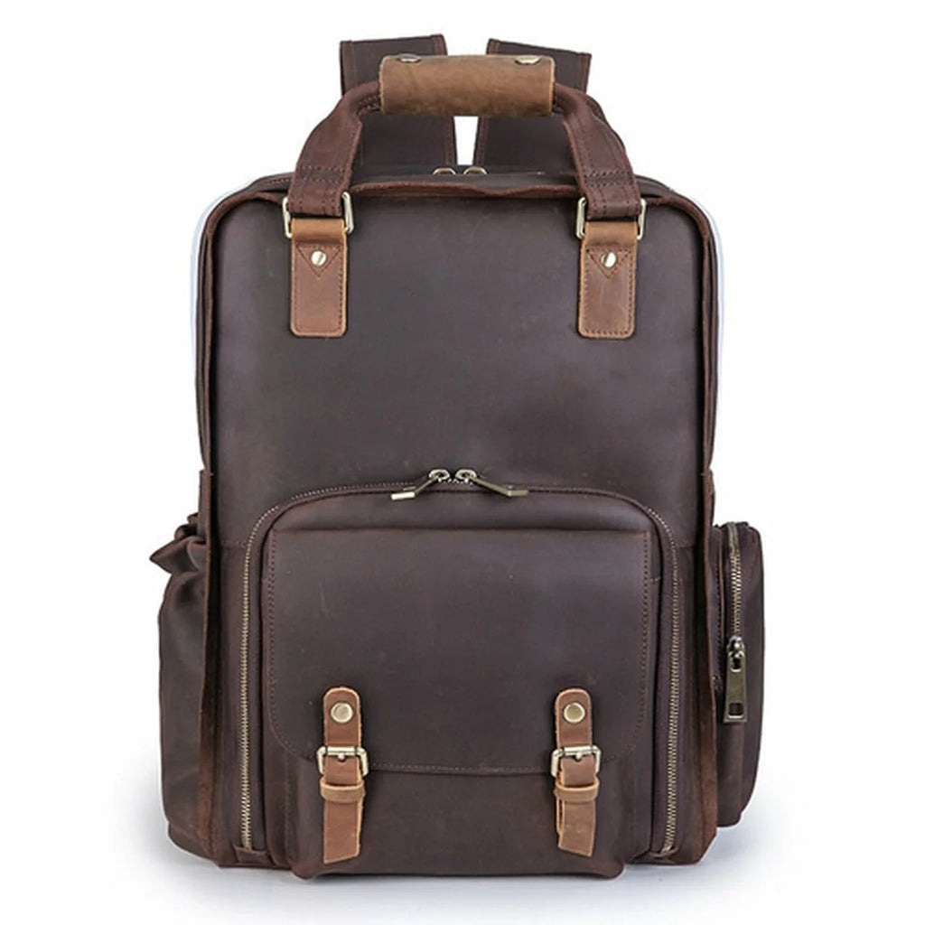 Brown leather backpack with gold accents on a white background