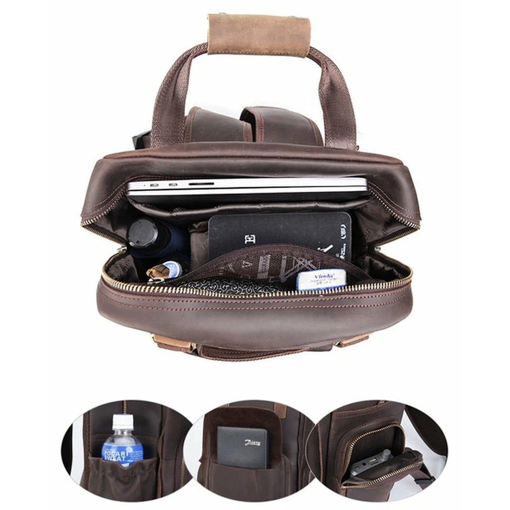 Brown leather briefcase with compartments and a laptop inside, on a white background.