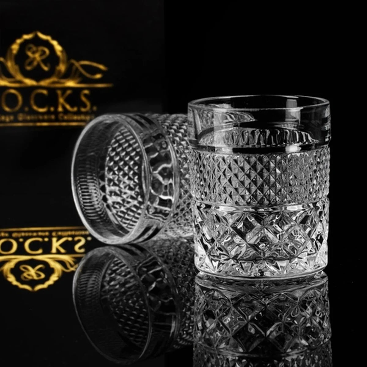 Decorative crystal glasses with a black background.