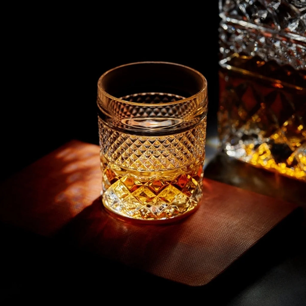 Decorative glass tumbler with whiskey