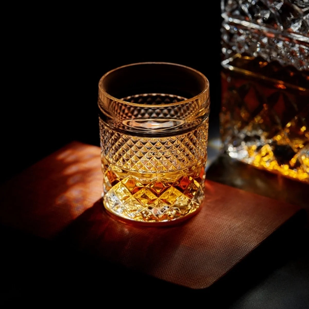 Decorative glass tumbler with whiskey