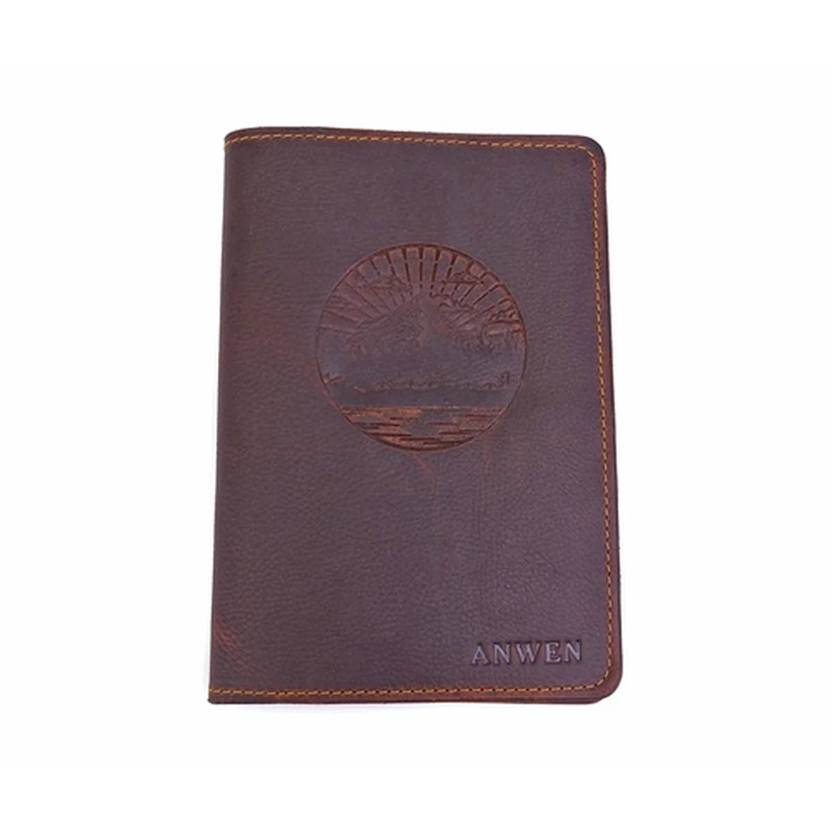 A dark brown leather passport cover featuring an embossed circular landscape design in the center and the brand name 'ANWEN' debossed near the bottom right, set against a plain white background.