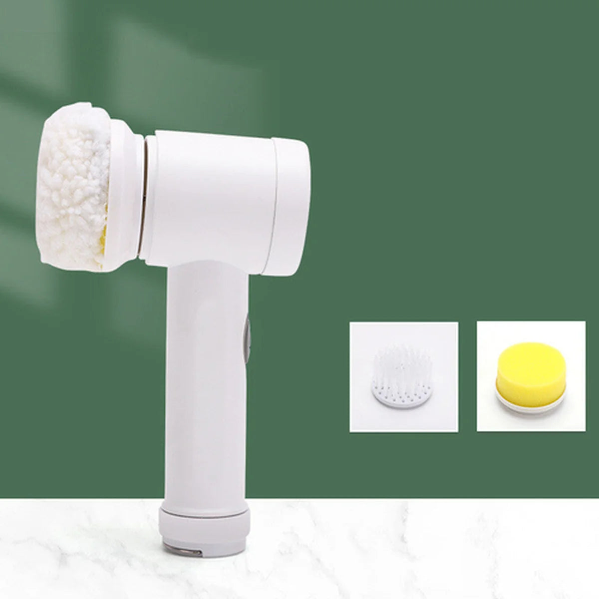 White handheld cleaning brush with interchangeable heads on a green background